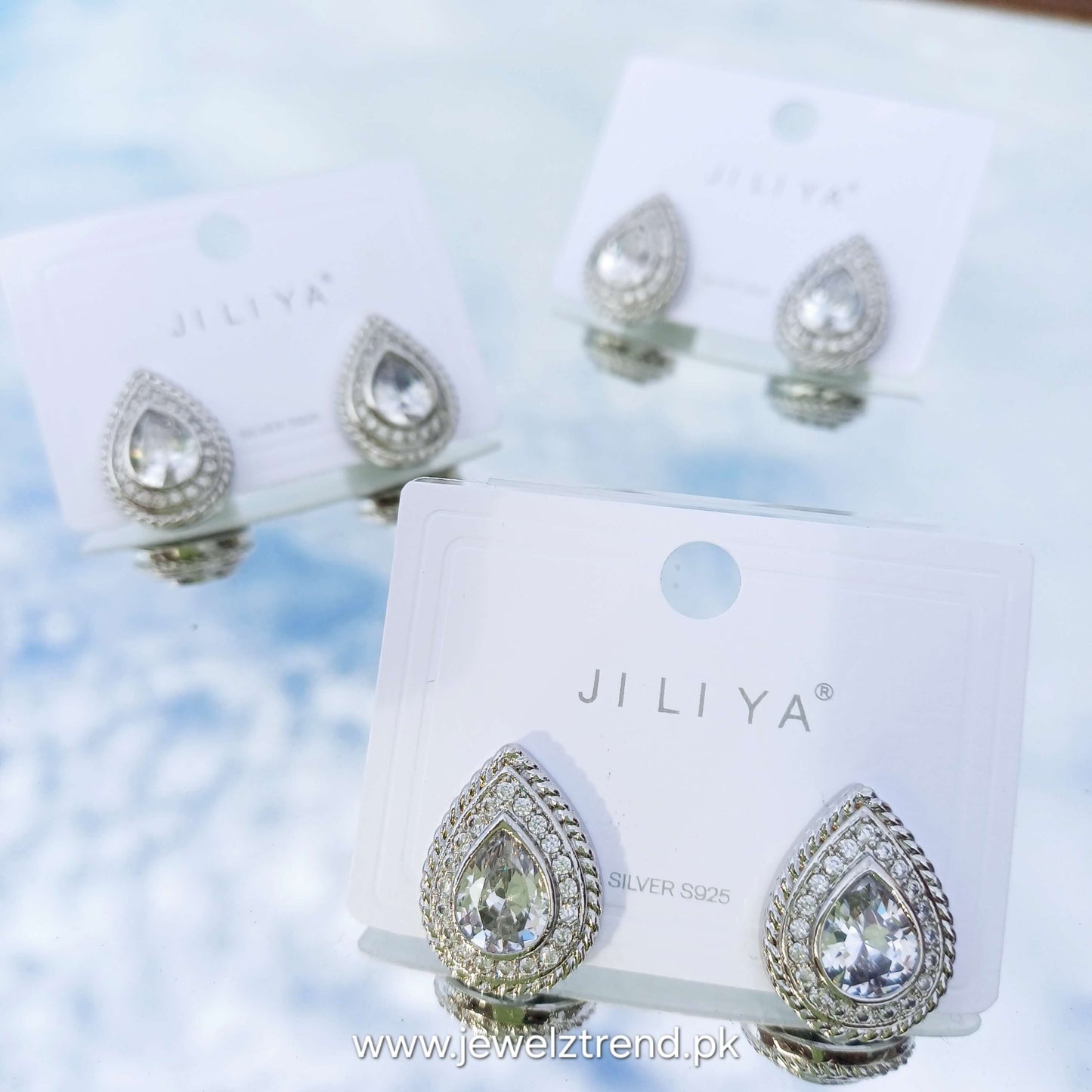 Silver studs palm shaped