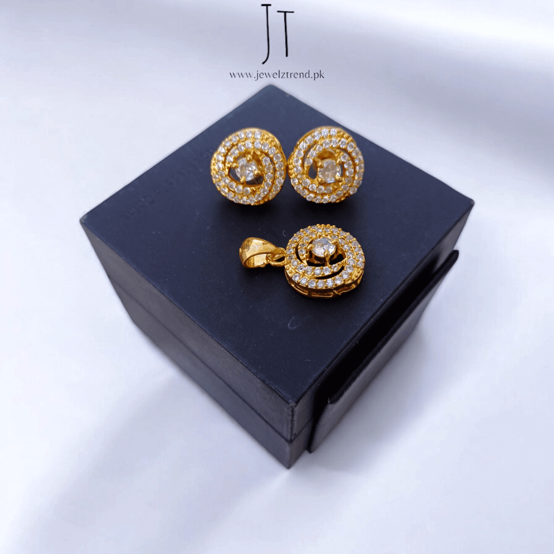 Sleek Shimmer: American Diamond Locket Set Gold