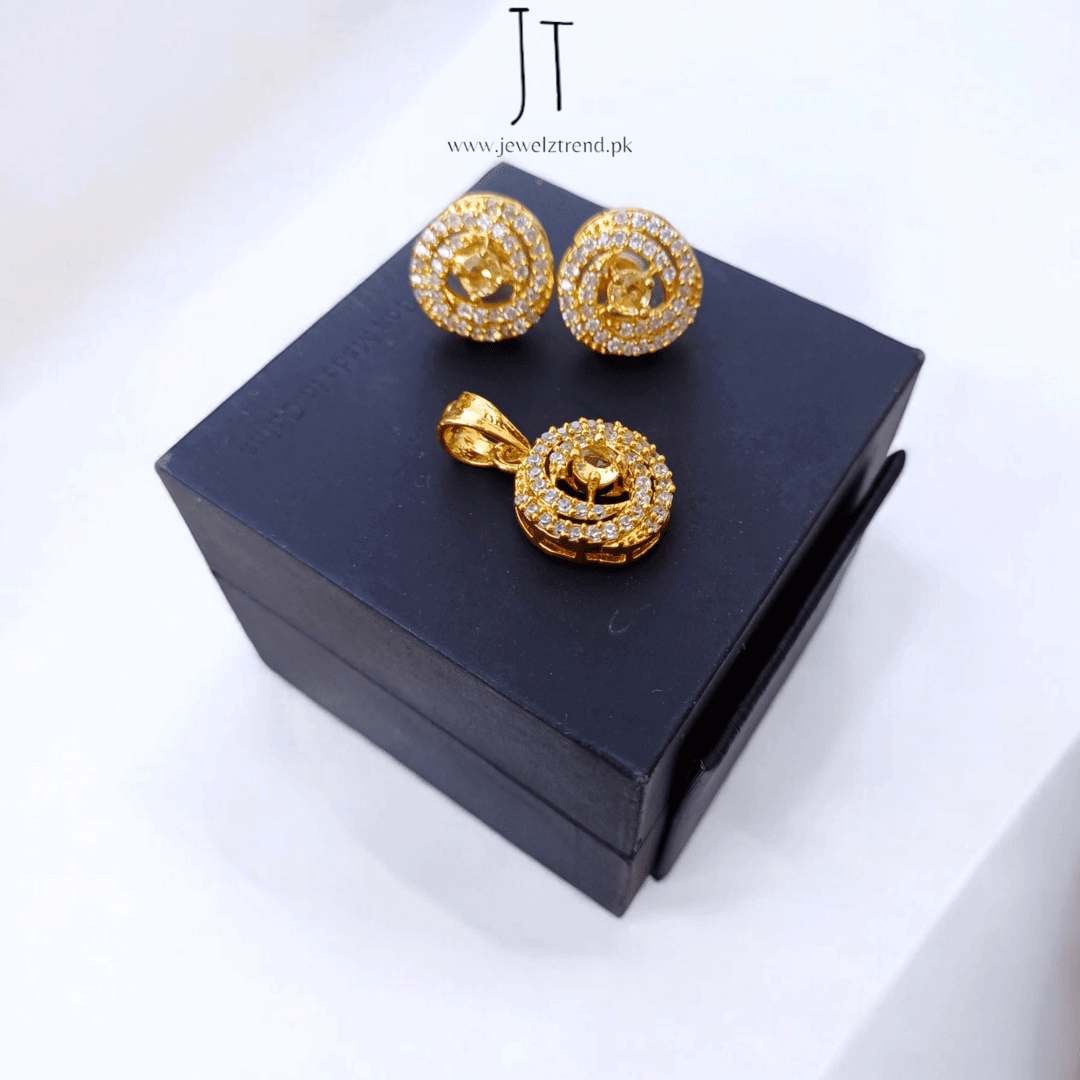 Sleek Shimmer: American Diamond Locket Set Gold