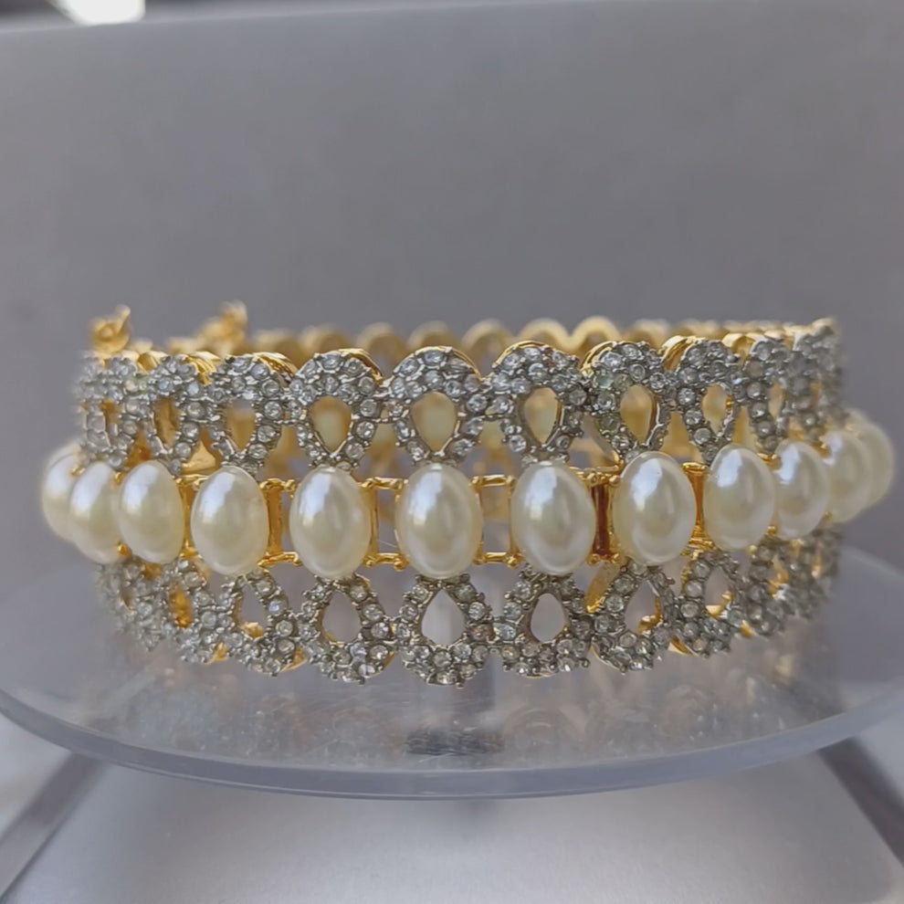 Elegance Defined: Centered Pearl Kangan