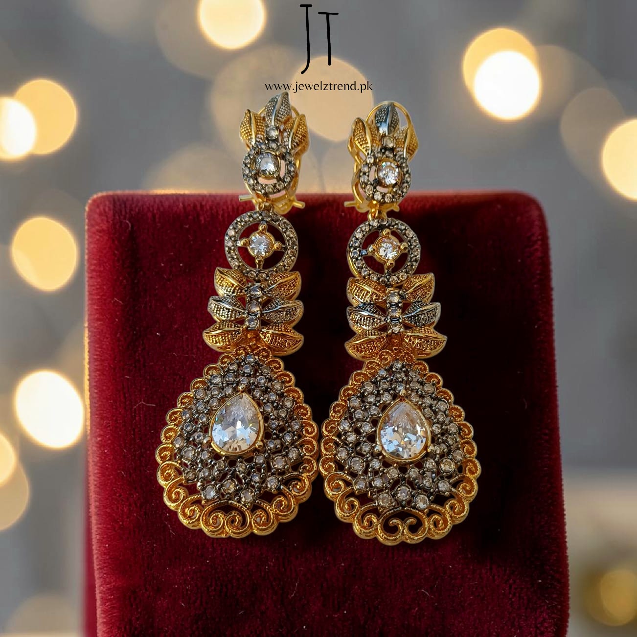 Whispering Leaf: Designer Earrings
